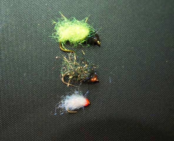 The Fairyfly fly lure on a table.