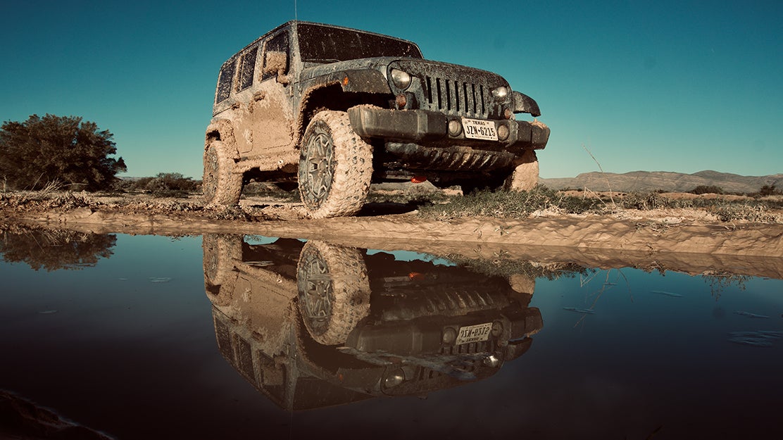 jeep with mud all over it