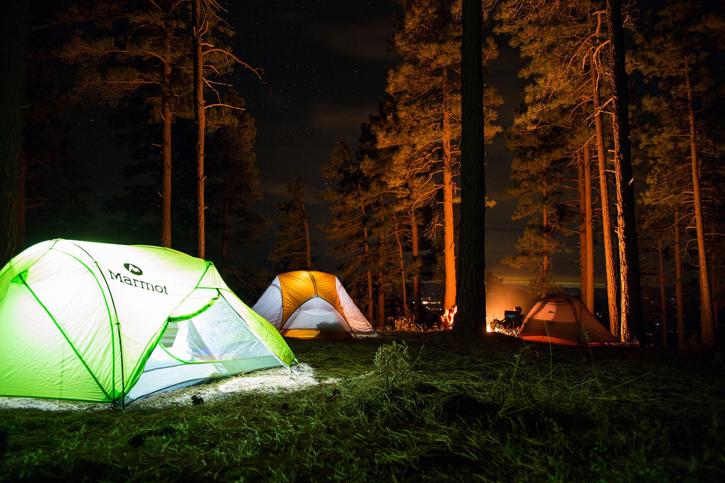 tents at night with lights on