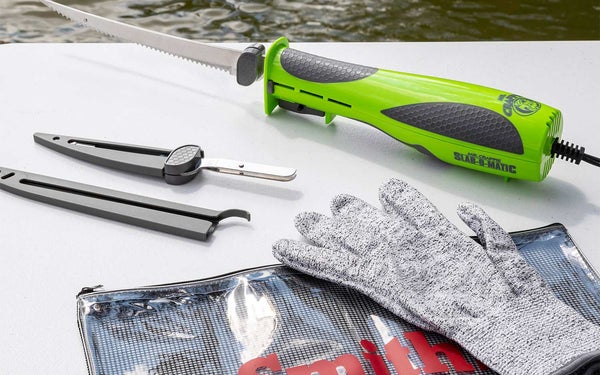 Mr. Crappie Slab-O-Matic Electric Fillet Knife on a boat deck.