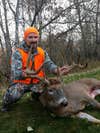 Kyle Dulek with a 165-inch 10-point whitetail buck.