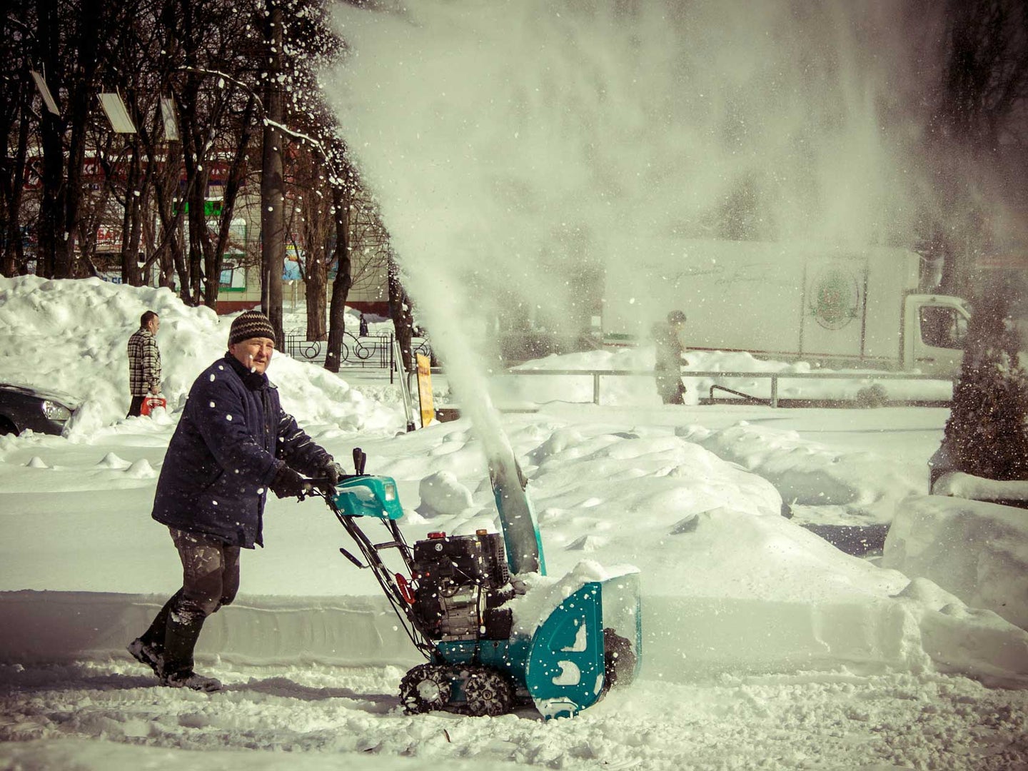Man clearing snow with the best snow blower