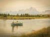 Two anglers in a boat at Grand Teton National Park.