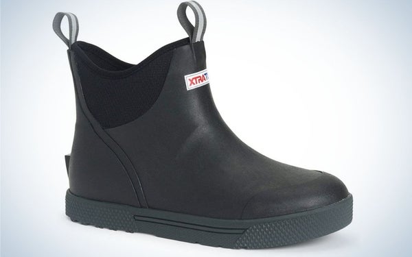 A full black boot with the name of brand in front of it.