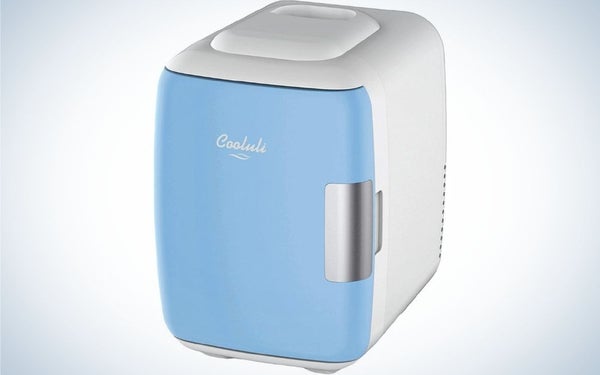 A white and light blue bow Cooluli mini fridge electric cooler and warmer.