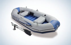 Blue and light gray inflatable boat with black paddles