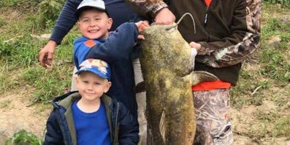 On His Very First Fish, 7-Year-Old Angler Catches One of the Biggest Catfish Ever in Tennessee