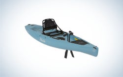 A kayak in light blue color in the body and black on the place where you can sit.