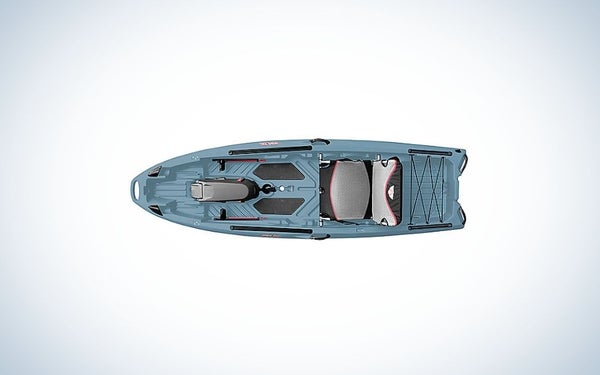 A kayak in light blue color in the body and black on the place where you can sit captured from the front.