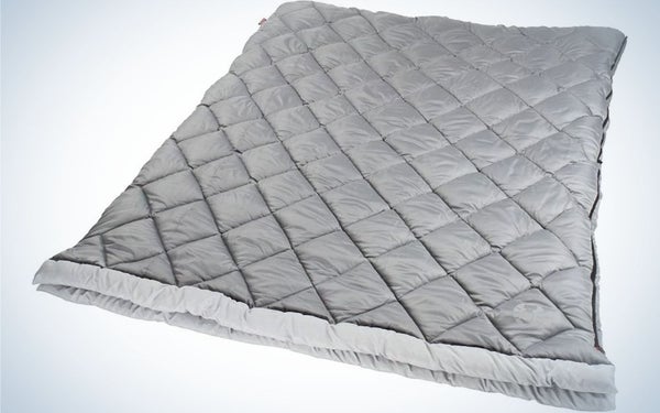 A large double sleeping bag in a grey color for the adults.