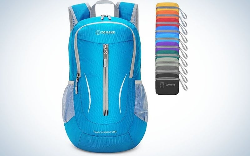A hiking backpack with a pronounced blue color and a series of colors lined up next to each other.