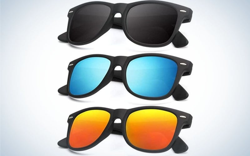 Three pairs of glasses with the same skeletal structure and all three with different neon colors, respectively dark black, neon blue and orange in neon yellow.