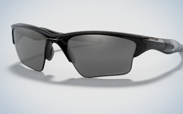 A pair of sportive glasses with a black skeleton structure and also light black lenses with name f brand into the skeleton.