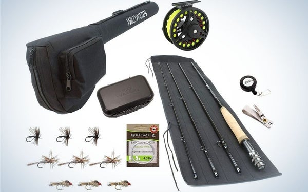 A complete kit full of fishing accessories, starting with a black fly rod, a large bag and a reel combo.