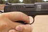Trigger control with a handgun