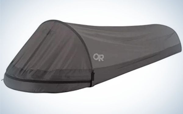 A tent for camping and winds all in the form of a single bed.