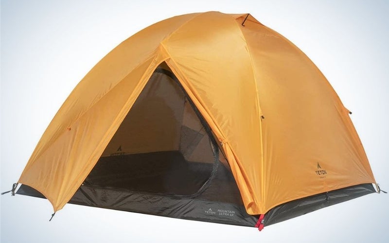 A bright brick color tent from above, as well as with the front part open and the bottom part black support.