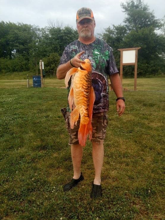 Tim Ownings with a 9-pound Koi.