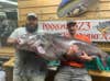 Rocky Baker, left, with the new record North Carolina blue cat. 