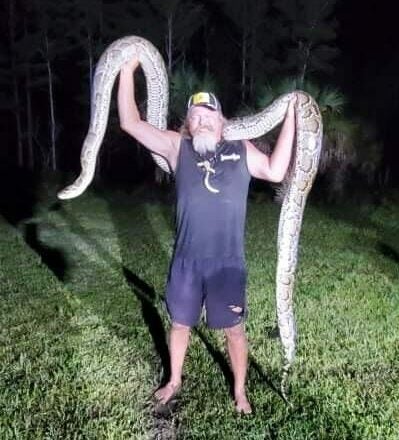 Barry Crum and 16-foot python