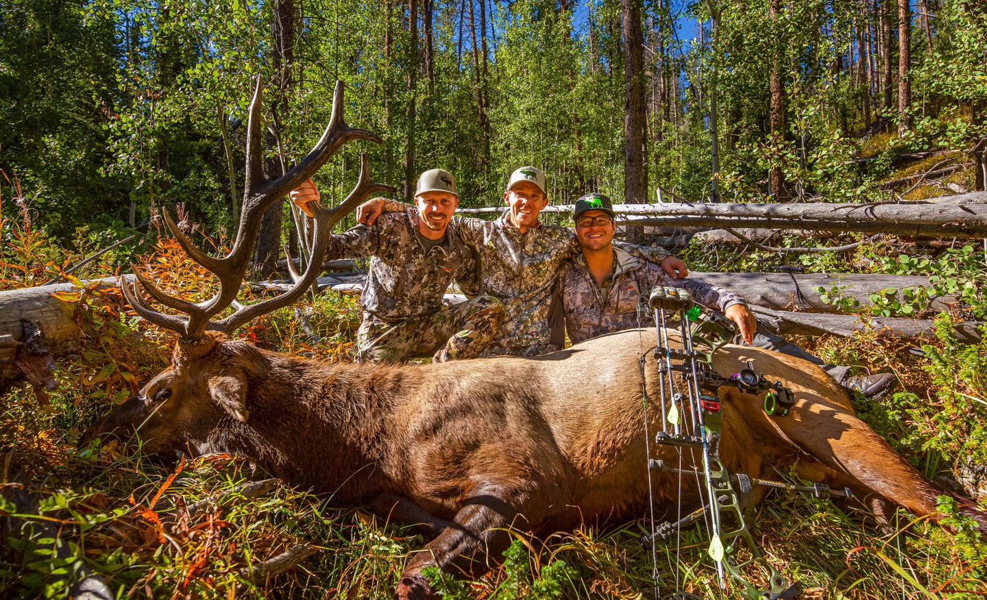Jace Bauserman and friends with bull elk