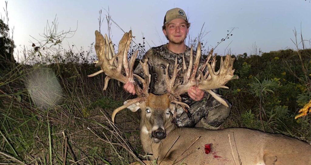 Blake Keating and captive whitetail deer
