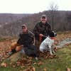 Turkey hunters with a turkey dog
