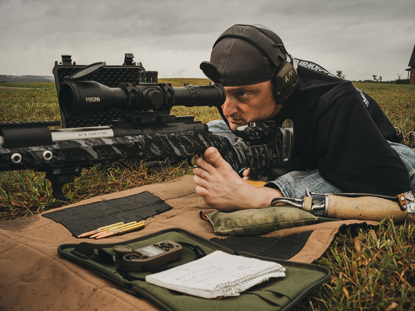 Aaron Miesse shoots a long-range rifle
