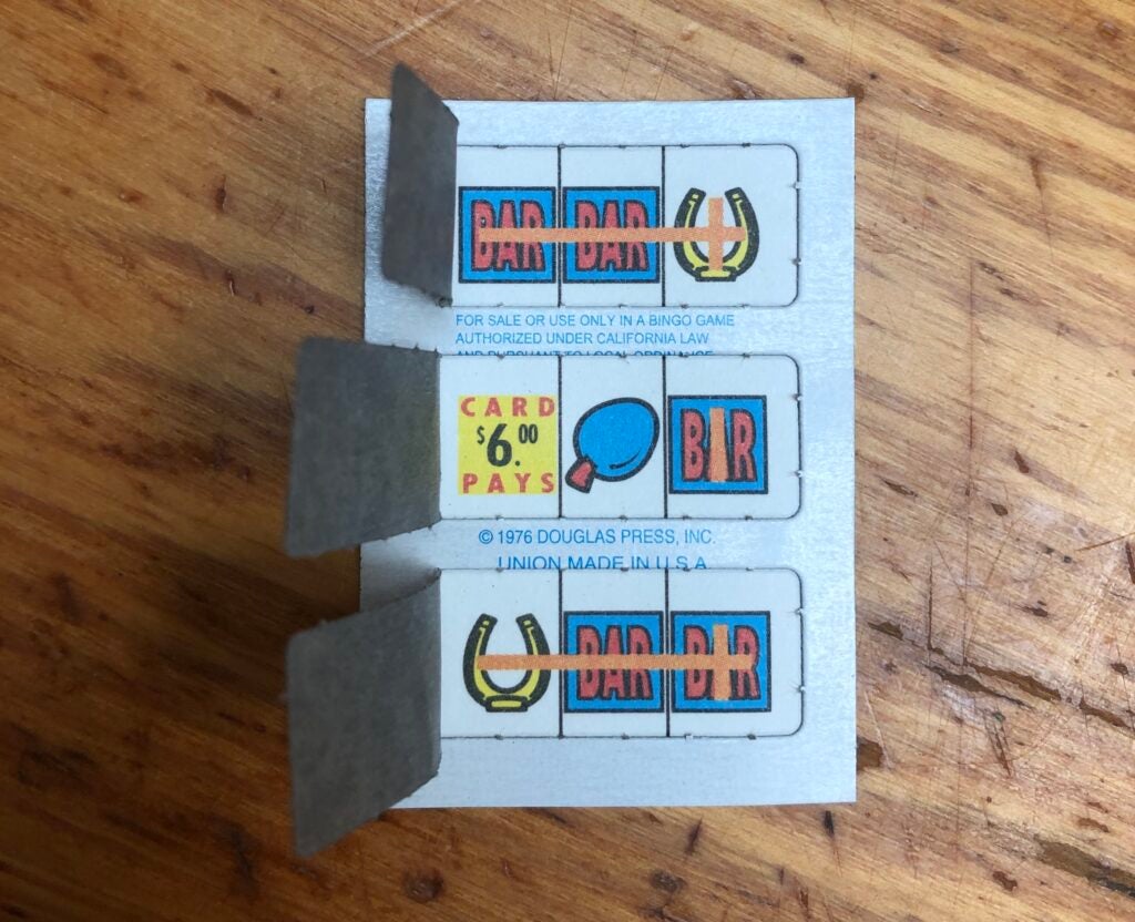 Pull-tab lottery card from Alaska.