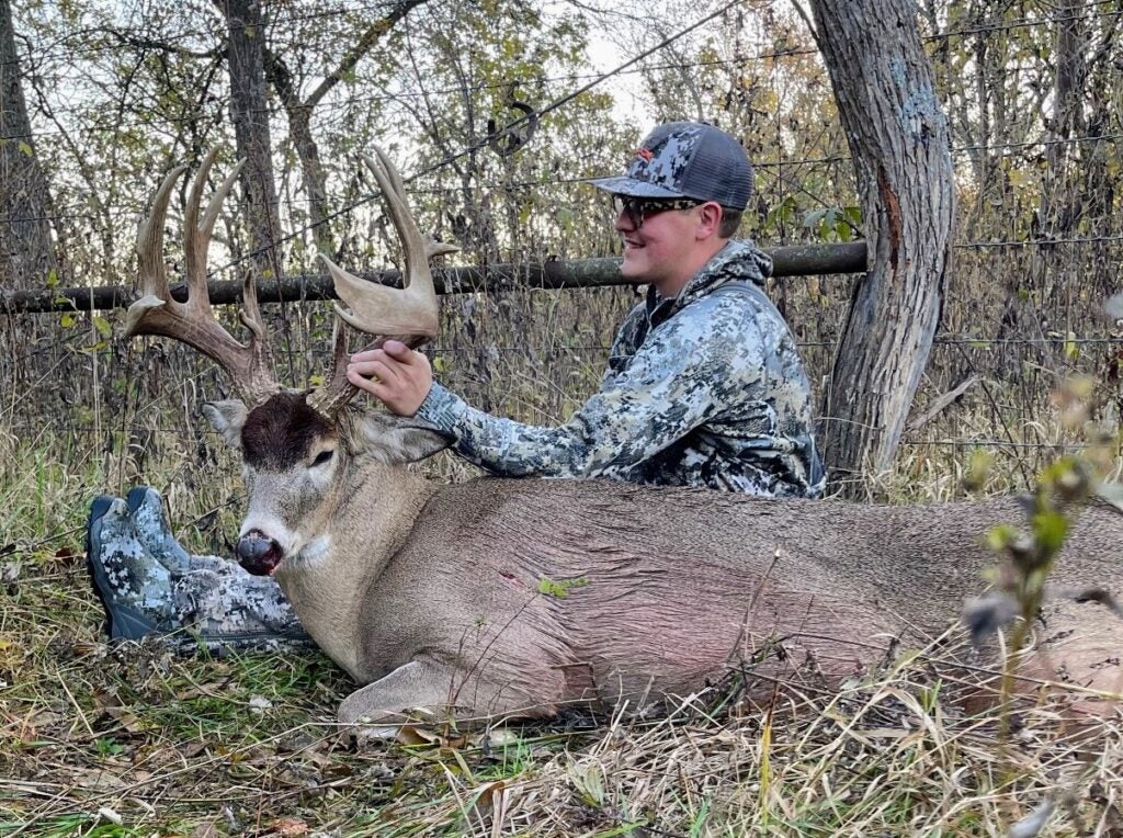 Hunter with huge 8-point buck