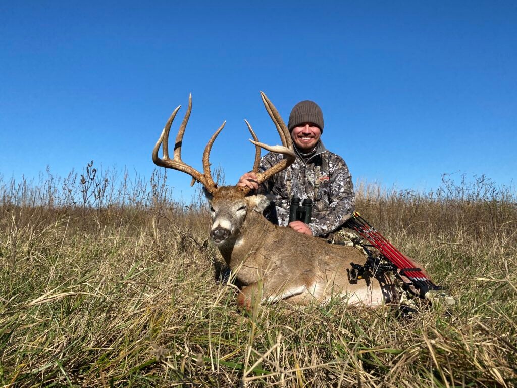 hunter with huge 8-point buck
