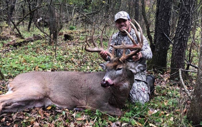 hunter poses with big Wisconsin buck
