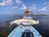 Fly fisherman with a baby tarpon
