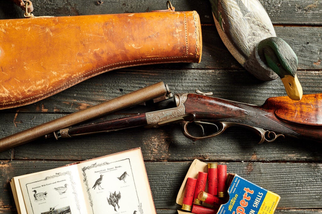 photo of vintage shotgun with decoy