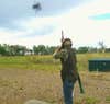 The author breaking clays during hunting season. 