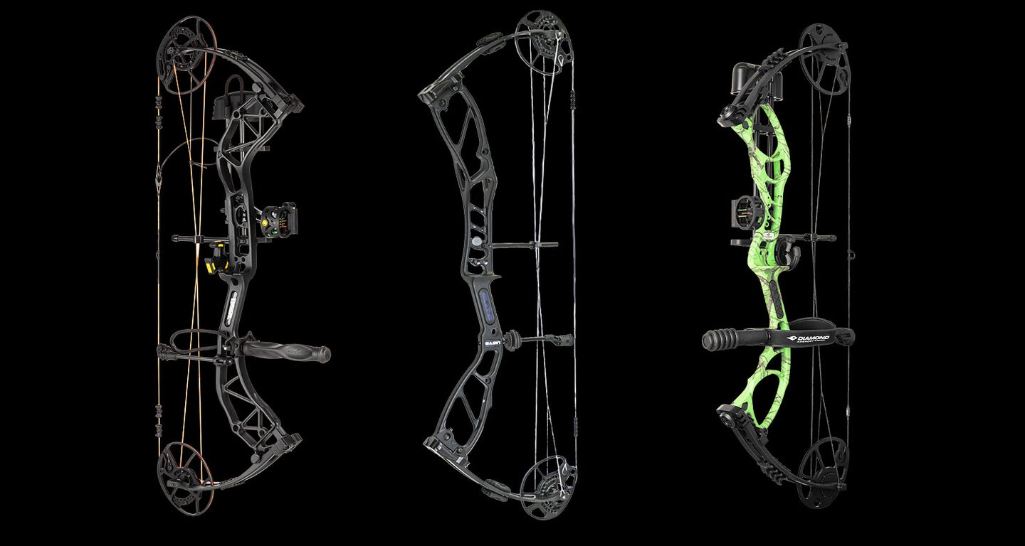Three compound bows on a black background.