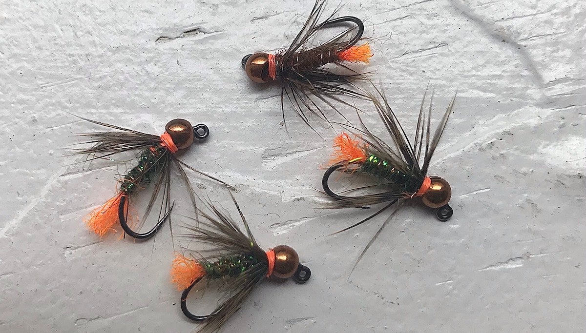 Blowtorch fly fishing pattern on a table.