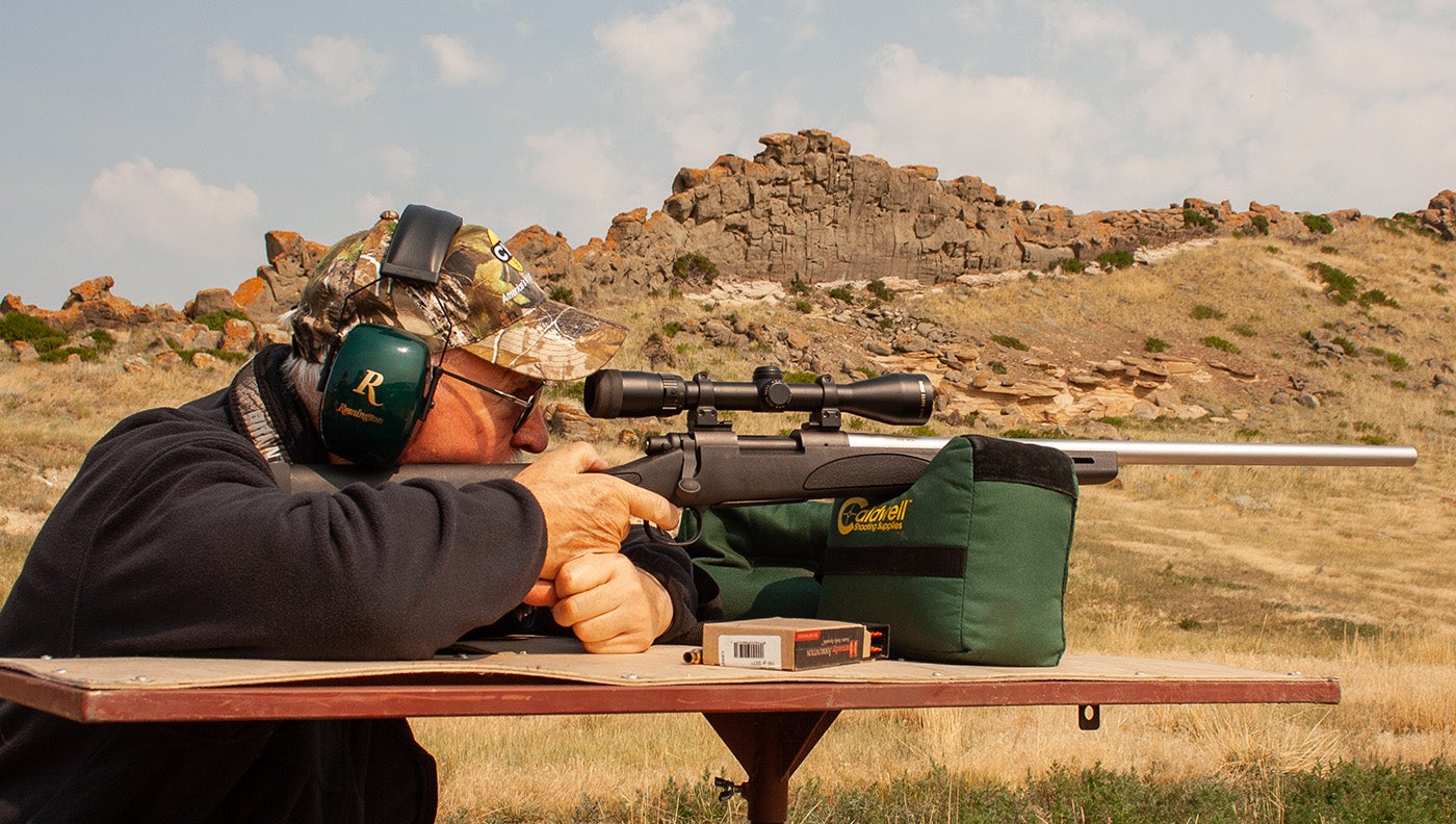 photo of hunter shooting rifle
