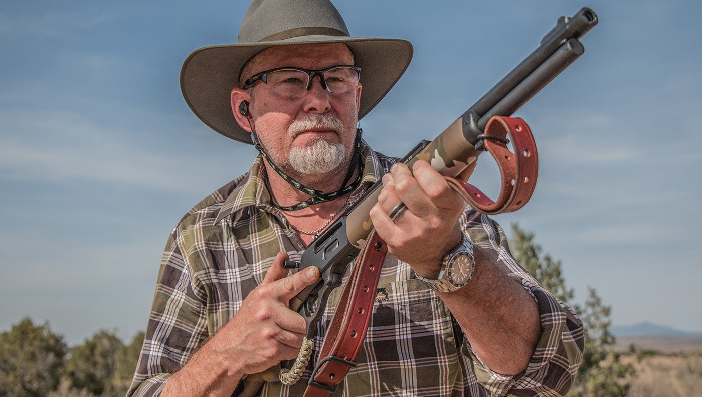 photo of hunter with lever-action rifle