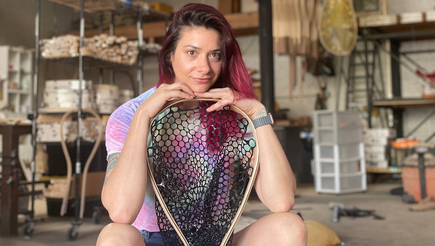 photo of artist with fishing net