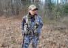 Female hunter wearing Sitka Equinox Turkey Vest in the field