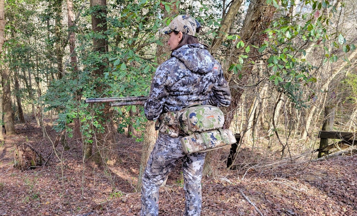 Female hunter wearing Sitka Turkey Tool Belt in the field