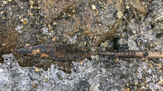 well preserved arrow with rock arrowhead