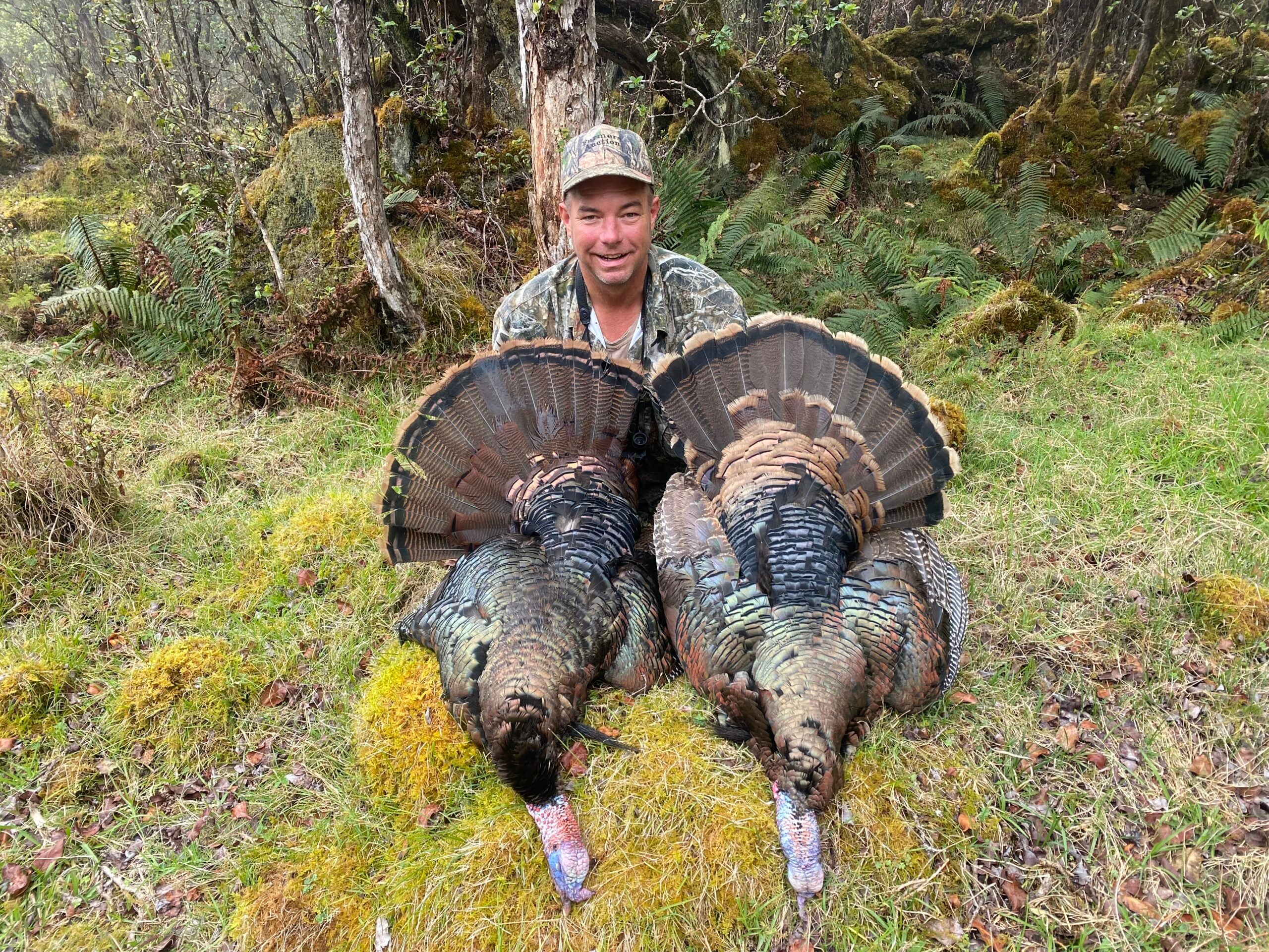 photo of hunter with turkeys