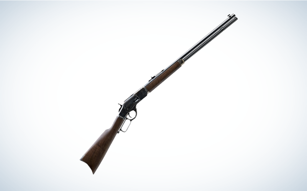 Winchester 1873 Sporter Octagon Lever-Action Rifle on gray and white background