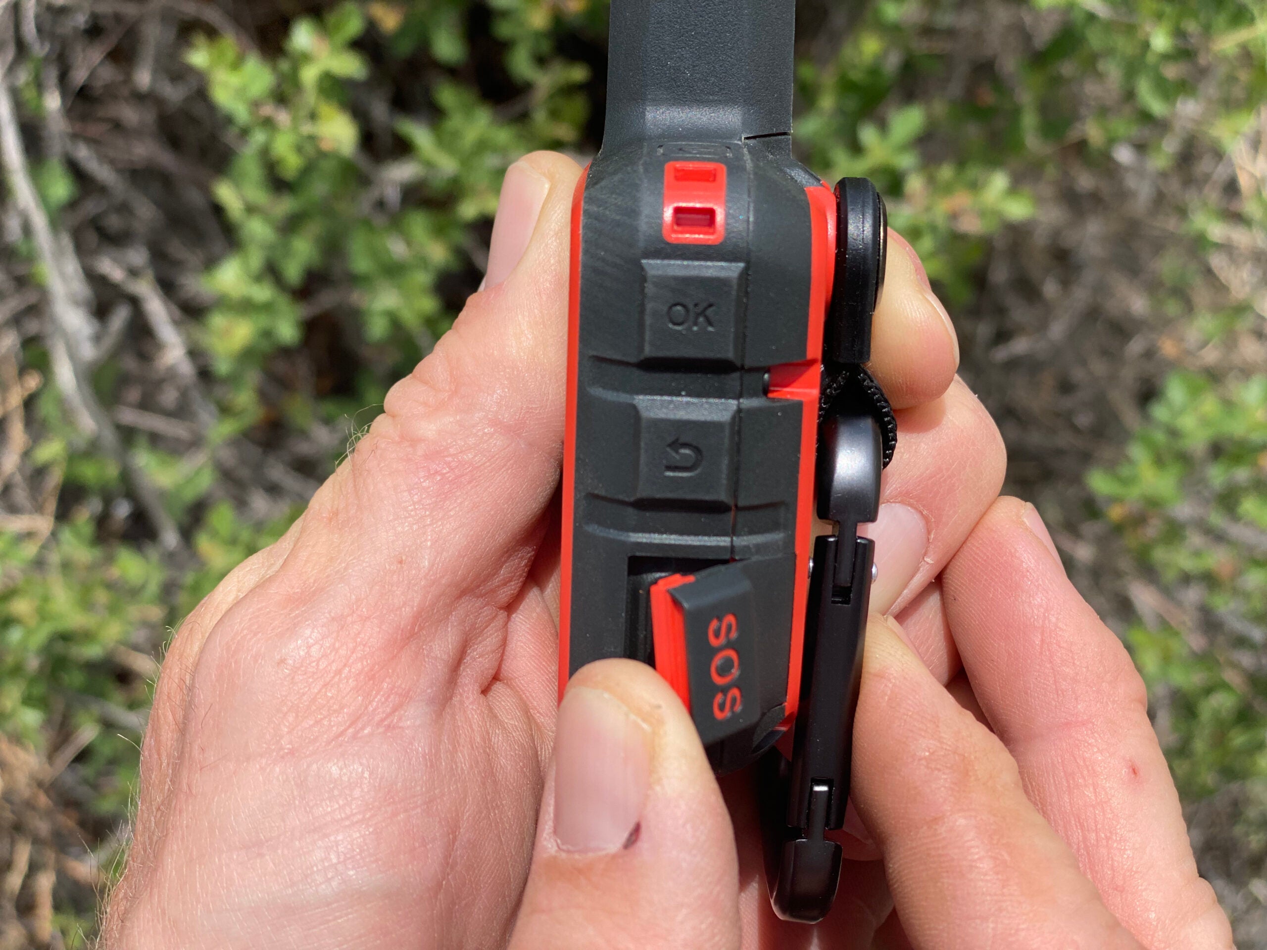 Right side of Garmin inReach Mini 2, displaying OK, Back and SOS buttons