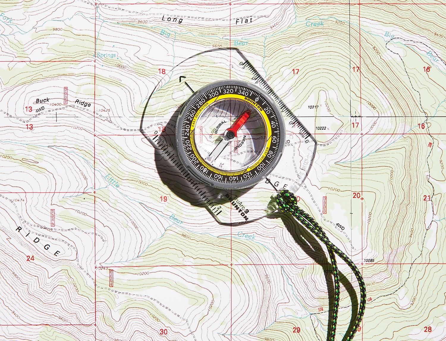 baseplate compass on paper map