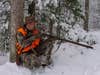 photo of hunter with muzzleloader
