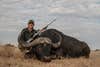 photo of hunter with cape buffalo