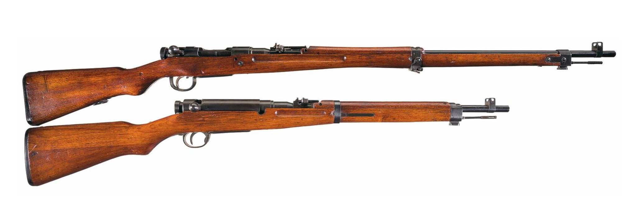 Two Arisaka rifles with bolts.
